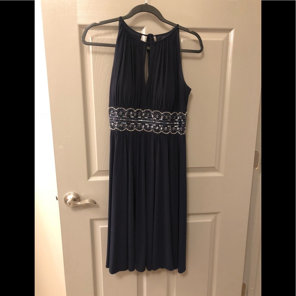 Navy keyhole dress with beaded details